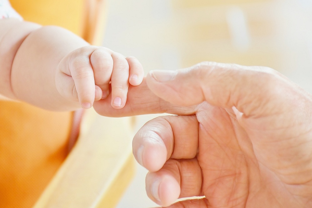 Capoculla per neonati: la gioia di accogliere una nuova vita - Holyblog