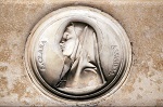 Saint Clare of Assisi, bass relief in portico of church dei Santi XII Apostoli in Rome, Italy